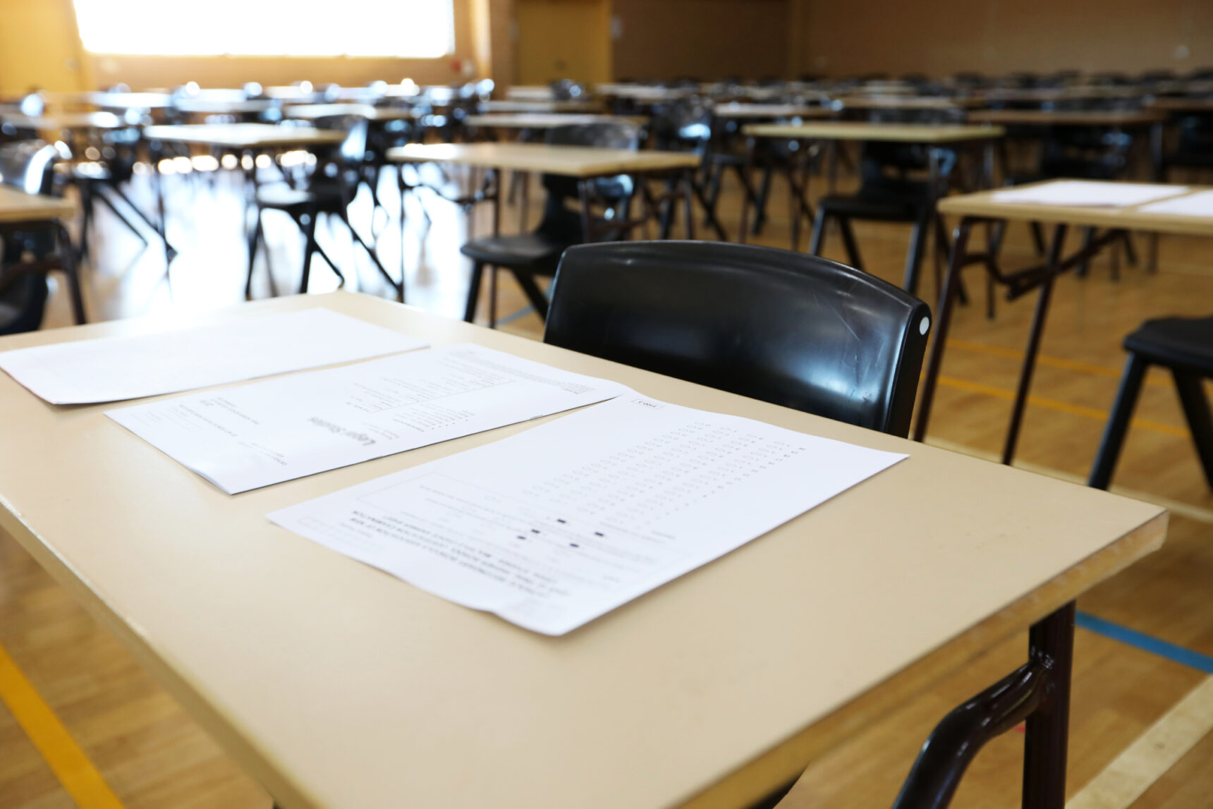 An exam room laid out with desks and chairs ready for mock exams.
