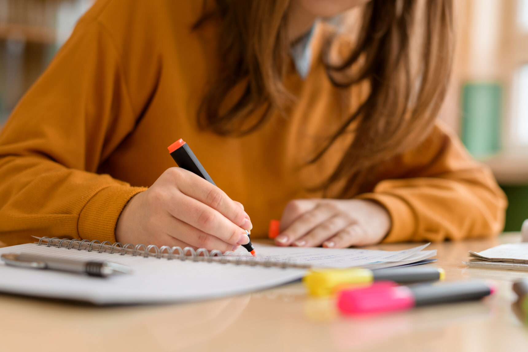 A GCSE student is highlighting notes as she prepares for the unseen poetry section of the English Literature exam.